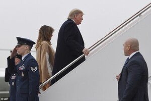 24151758-7954119-Melania_and_President_Trump_are_seen_here_walking_up_the_stairca-a-19_1580517861276.jpg