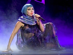 24206132-7958421-Modest_Gaga_used_a_sheer_piece_of_material_to_cover_up_one_of_he-a-6_1580669184005.jpg