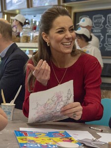 24297860-7964773-The_Duchess_beamed_she_spoke_with_parents_and_carers_to_hear_abo-a-38_1580831678000.jpg