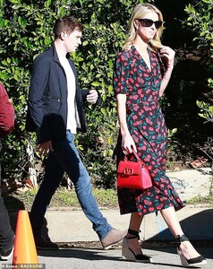 24492302-7982831-Cute_couple_Nicky_was_seen_leaving_the_party_with_her_husband_Ja-a-39_1581220244118.jpg