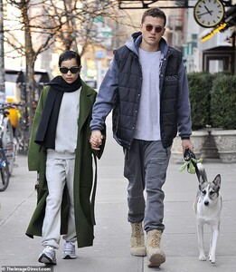 24660248-7996907-Party_pup_The_couple_are_also_extremely_close_with_their_fur_bab-a-8_1581539211245.jpg