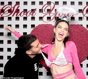 24721372-8002543-Taking_a_bite_out_of_her_bra_The_Burberry_brand_ambassador_got_a-a-83_1581655676216.jpg