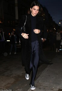 24816718-8010689-Black_Balenciaga_She_kept_warm_in_a_long_black_velvet_Balenciaga-a-64_1581894158377.jpg