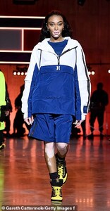 24817064-8010587-Catwalk_Winnie_25_donned_a_blue_and_white_sports_jacket_worn_ove-a-113_1581903602572.jpg