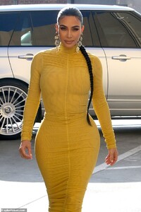 24965318-8023515-Dangerous_curves_ahead_The_fitted_dress_clung_to_every_inch_of_K-a-56_1582183698075.jpg