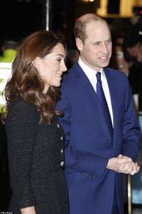 25188074-8043087-The_Duke_and_Duchess_of_Cambridge_looked_smart_for_their_attenda-a-36_1582660671224.jpg