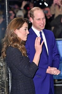 25188372-8043087-And_Kate_cut_a_glamorous_figure_as_she_smiled_at_royal_fans_wait-a-47_1582660671258.jpg