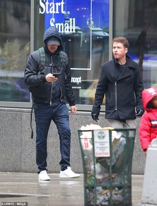 25195414-8044379-Multitasking_Leo_checked_out_his_phone_as_he_walked_with_Connoll-a-2_1582675879674.jpg