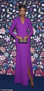 25239592-8048429-Glamorous_Leomie_Anderson_looked_sensational_in_an_elegant_purpl-a-351_1582768523585.jpg