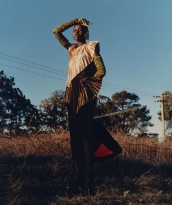 Andrew-Nuding-Vogue-Adut-Akech-13-857x1024.thumb.jpg.bcef5af946272c5ddbd1238cae98c418.jpg
