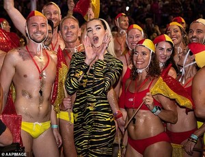 25355620-8059277-Wild_child_Dua_Lipa_dons_a_neon_yellow_and_black_zebra_print_bod-a-17_1582979936979.jpg