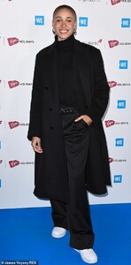 25521234-8073461-Beaming_Adwoa_Aboah_looked_chic_in_all_black_as_she_flashed_a_sm-a-118_1583319680636.jpg