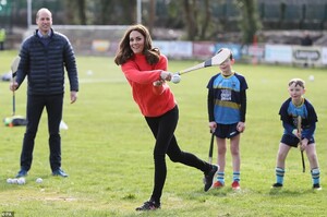 25578708-8077861-Kate_swings_her_hurling_stick_as_she_tries_out_the_sport_during_-a-364_1583424603527.jpg