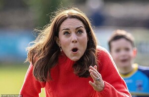 25579830-8077861-Kate_reacts_after_hitting_the_ball_while_trying_to_play_hurling_-a-362_1583424603504.jpg