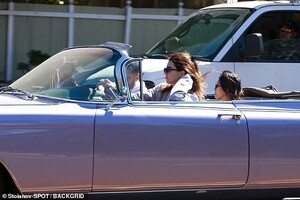 26142932-8128689-Could_it_be_Jenner_later_picked_up_a_second_passenger_a_dark_hai-a-20_1584581138766.jpg