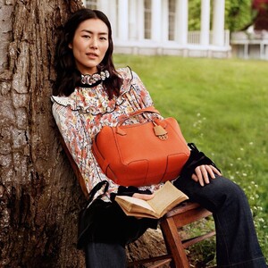 Download Chinese model Liu Wen flaunts a designer Moynat bag