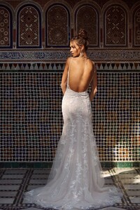 AVA-ML17121-FULL-LENGTH-FITTED-LACE-GOWN-WITH-PLUNGING-NECK-AND-LOW-BACK-WITH-DETACHABLE-CAPE-AND-BELT-WEDDING-DRESS-MADI-LANE-BRIDAL3.jpg