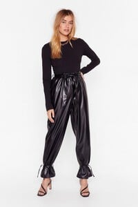 black-part-of-the-crew-neck-high-leg-bodysuit.jpeg