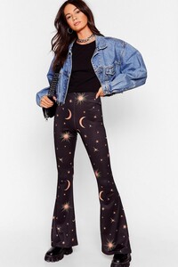 black-universally-speaking-star-and-moon-flare-pants (1).jpeg