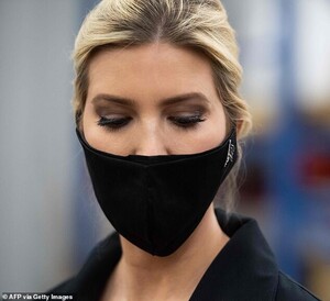 28435844-8323635-Covering_up_Ivanka_kept_her_face_mask_on_throughout_the_visit_al-m-71_1589564354789.jpg