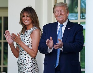 28451046-8325085-Breaking_the_rules_President_Donald_Trump_and_first_lady_Melania-a-44_1589585400640.jpg