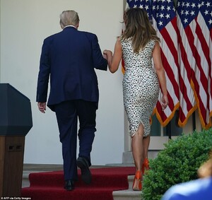 28452560-8325085-Off_they_go_Trump_took_his_wife_s_hand_as_they_exited_the_Rose_G-a-59_1589585401536.jpg