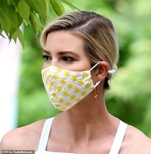 28890198-8362435-The_38_year_old_The_first_daughter_donned_a_mask_with_yellow_flo-a-11_1590601221521.jpg