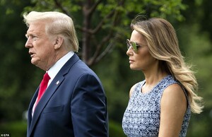 28895036-8362595-The_Trumps_walked_together_to_Marine_One_Wednesday_as_they_heade-a-82_1590610989421.jpg