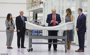 28899122-8362595-Upon_arrival_President_Trump_center_right_and_first_lady_Melania-a-103_1590610989470.jpg