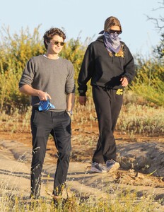 sofia-richie-in-black-hoodie-and-matching-mada-honeys-sweatpants-hiking-in-malibu-05-14-2020-13.jpg