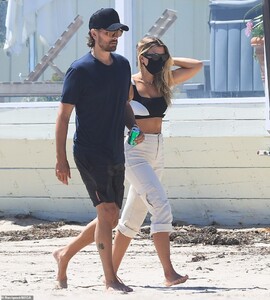 30401978-8490863-Fourth_Of_July_The_pair_who_first_began_dating_in_2017_grabbed_l-a-10_1593919941580.jpg