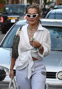 31140950-8555961-Fashionista_Rita_jazzed_up_her_low_key_outfit_with_a_plethora_of-a-23_1595580509562.jpg