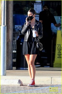 camila-morrone-chats-on-the-phone-while-on-coffee-run-03.jpg