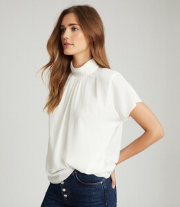 -womens-yara-high-neck-ss-top-in-ivory-white-cream-3.thumb.jpg.1d7361474a5e75ae1124d08a473bba26.jpg