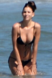 camila-morrone-wears-a-black-bikini-while-enjoying-a-beach-with-her-mother-lucila-solá-in-malibu-california-090820_6.jpg