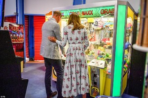 31594916-8595903-The_royal_couple_even_took_the_chance_to_play_a_grab_a_teddy_gam-a-2_1596635812802.jpg