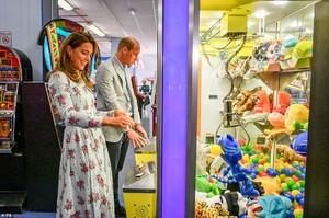 31595346-8595903-The_royals_also_played_a_teddy_game_as_the_Duchess_picked_up_a_b-a-12_1596635814533.jpg