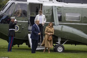 32029104-8634033-President_Trump_arrived_back_at_The_White_House_on_Sunday_evenin-a-29_1597635269588.jpg