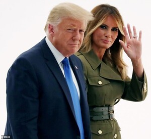 32399740-8665337-Melania_pictured_with_Donald_Trump_opted_to_wear_her_light_brown-m-52_1598454027332.jpg