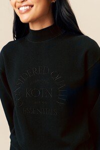 Embroidered_Mock_Neck_Sweatshirt_Black_Editorial_5000x - Copy.jpg