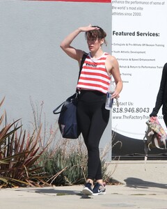 milla-jovovich-leaves-a-gym-in-los-angeles-05-30-2019-6.jpg