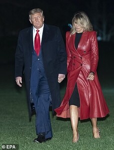 36511410-9023367-The_First_Lady_s_vibrant_red_coat_perfectly_matched_her_husband_-a-36_1607270758289.jpg