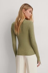 mathilde_gohler_wool_collar_knitted_sweater_1658-000057-0052_03b.thumb.jpg.eb28868231b7b99b9a34b62b1b8c5add.jpg