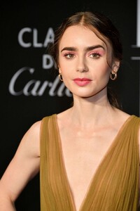 Lily-Collins---Harper’s-BAZAAR-celebrates-‘ICONS-By-Carine-Roitfeld’-in-NYC-02.jpg