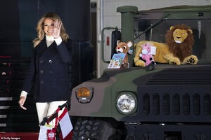 36604956-9030983-Melania_Trump_arrives_for_the_annual_Marine_Toys_for_Tots_Drive_-a-38_1607460467547.jpeg