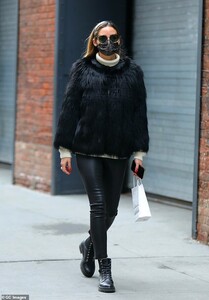 37890160-9136825-Struttin_The_fashion_influencer_34_wore_a_chic_shaggy_black_fur_-a-39_1610419759794.jpeg