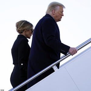 38251682-9167919-There_they_go_Following_Trump_s_speech_the_first_couple_boarded_-a-59_1611155447357.jpg