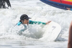 kourtney-kardashian-in-wetsuit-at-surf-lesson-in-malibu-09-27-2020-10.jpg