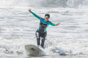 kourtney-kardashian-in-wetsuit-at-surf-lesson-in-malibu-09-27-2020-12.jpg