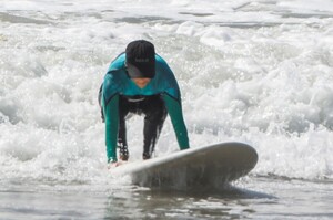 kourtney-kardashian-in-wetsuit-at-surf-lesson-in-malibu-09-27-2020-9.jpg